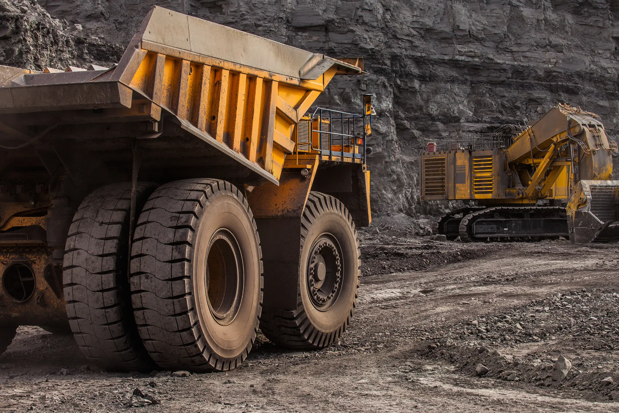 A dump truck in a quarry equipped with a mining wheel system- WSD Wheel Systems